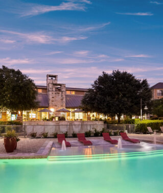 Exterior pool view at twilight